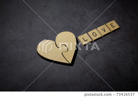 heart and wooden blocks with words In Love heart and wooden blocks with words In Love 73416537