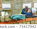 Tired woman civil engineer sleeping in work time 73417942