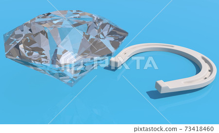 Concept of Horseshoe near gem on blue Concept of Horseshoe near gem on blue 73418460