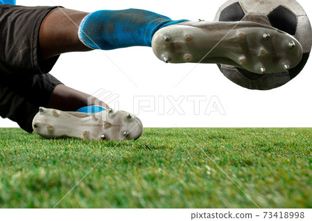 Close up legs of professional soccer, football player fighting for ball on field isolated on white background 73418998