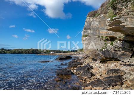 Stones close to the pier in Bruckless in County Donegal - Ireland. Stones close to the pier in Bruckless in County Donegal - Ireland. 73421865