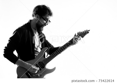 Musician with guitar rock star emotions entertainment modern performer Musician with guitar rock star emotions entertainment modern performer 73422614
