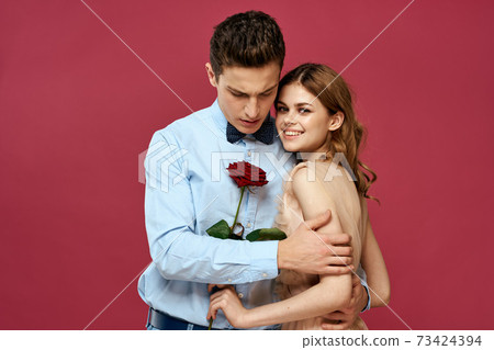 married couple man and woman romance red rose isolated background holiday flowers 73424394