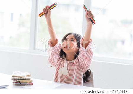 Kid studying Kid studying 73424423