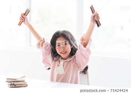 Kid studying Kid studying 73424424