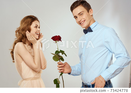 Man and woman with red rose romance love family couple holiday 73424778