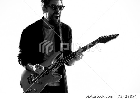 Musician with guitar rock star emotions entertainment modern performer Musician with guitar rock star emotions entertainment modern performer 73425854