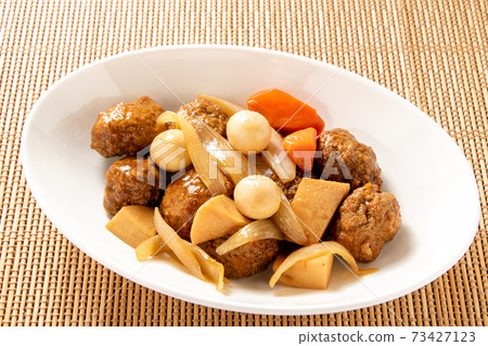 Sweet and sour pork-style meat dumplings. Sweet and sour pork-style meat dumplings. 73427123