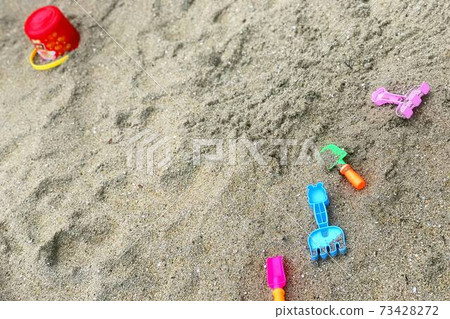 Bucket, shovel and sandbox in the park 73428272