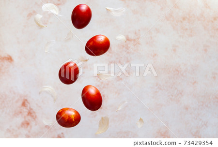 Easter levitation concept with colorful eggs, copy space Easter levitation concept with colorful eggs, copy space 73429354