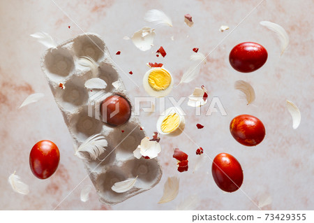 Easter levitation concept with colorful eggs 73429355