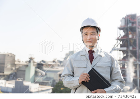 People working in the factory 73430422