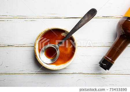 Worcestershire sauce in a bowl 73433890