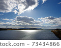 Winter clouds and the Yoshii River (view downstream from Ogawa Bridge) 73434866