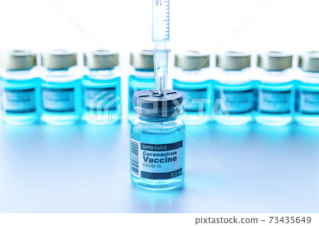 Disease outbreak. Medical syringe with needle for protection flu virus and coronavirus. Covid vaccine on white. Syringe, medical injection. 73435649