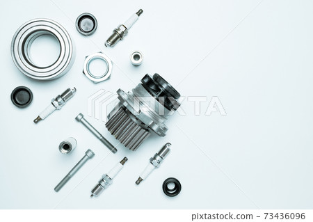 automotive parts. Set of new metal car part. Auto motor mechanic spare or automotive piece isolated on white background. Technology of mechanical gear with space for text. automotive parts. Set of new metal car part. Auto motor mechanic spare or automotive piece isolated on white background. Technology of mechanical gear with space for text. 73436096
