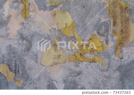 Grey weathered concrete wall with yellow paint texture, old rustic, free space for text or advertisement Grey weathered concrete wall with yellow paint texture, old rustic, free space for text or advertisement 73437263