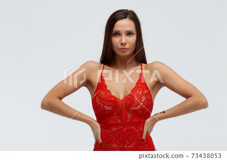 Sexy woman in lace bodysuit in studio 73438053