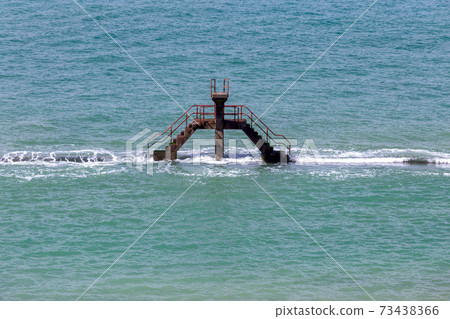 Saint-Malo. City embankment at high tide. Saint-Malo. City embankment at high tide. 73438366