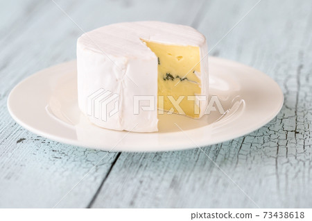 Blue cheese with white mould Blue cheese with white mould 73438618