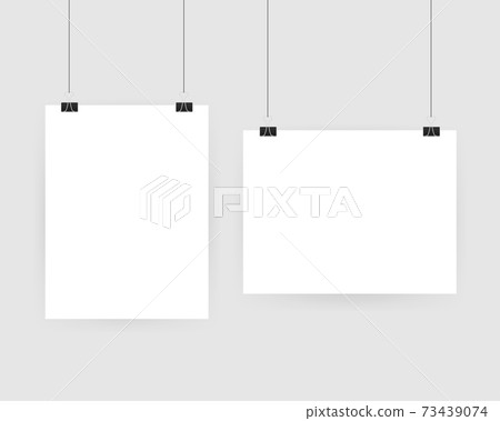 Set of multicolored binder clips on a piece of paper on a transparent background. Clerical clothespin 73439074
