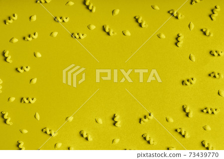 pasta in bulk on a blue background pasta in bulk on a blue background 73439770