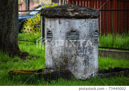 City bomb shelter tower standing in residential yard City bomb shelter tower standing in residential yard 73440002