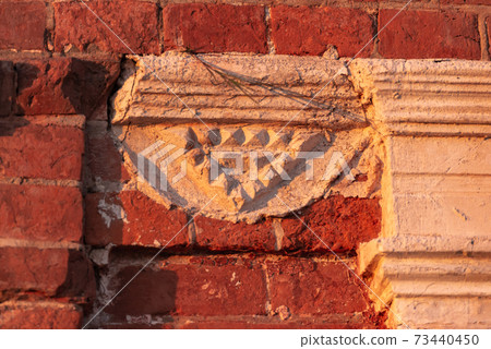 Gothic Orthodox Cathedral. Neo-Gothic Orthodox Church with Masonic symbols. Triangle on the bas-relief. Gothic Orthodox Cathedral. Neo-Gothic Orthodox Church with Masonic symbols. Triangle on the bas-relief. 73440450