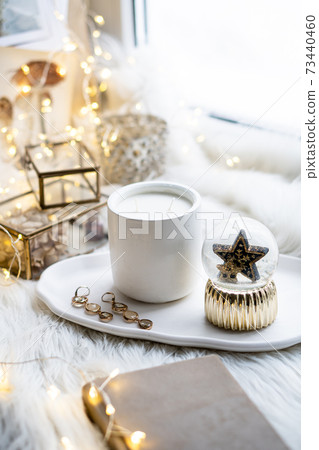 Beautiful home decorations with candle and star on white tray 73440460