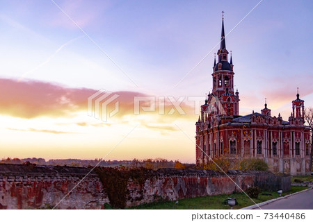 Gothic Orthodox Cathedral. Neo-Gothic Orthodox Church with Masonic symbols. Church at sunset. Gothic Orthodox Cathedral. Neo-Gothic Orthodox Church with Masonic symbols. Church at sunset. 73440486