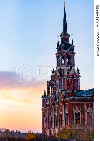 Gothic Orthodox Cathedral. Neo-Gothic Orthodox Church with Masonic symbols.Church at sunset. 73440489