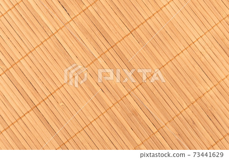 Full frame close-up shot of a bamboo food mat diagonal. Full frame close-up shot of a bamboo food mat diagonal. 73441629