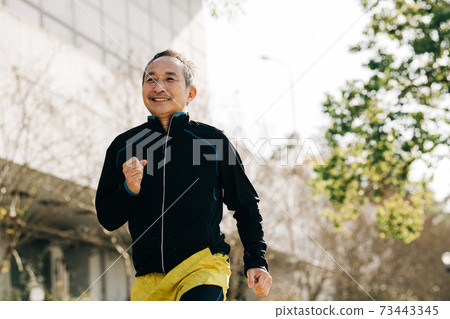 Japanese man in his 60s jogging Fitness / health image 73443345