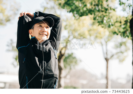 Japanese men in their 60s doing gymnastics and stretching Health / fitness image 73443625