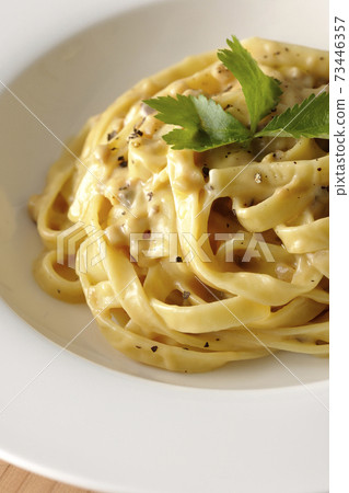 Flat pasta with truffle cream with trefoil Flat pasta with truffle cream with trefoil 73446357