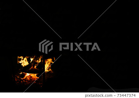 Flame of wood stove 73447374