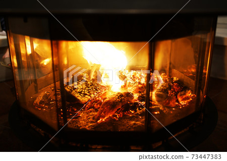 Flame of wood stove Flame of wood stove 73447383