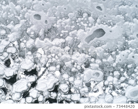 A picture painted by nature on ice in winter 73448420