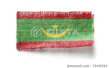 Mauritania flag on a piece of cloth on a white background Mauritania flag on a piece of cloth on a white background 73449161