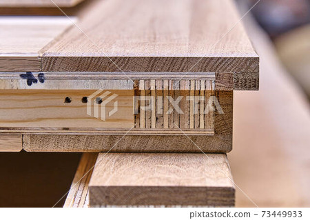 Joinery. Door leaf. Wood door manufacturing process. Furniture manufacture Joinery. Door leaf. Wood door manufacturing process. Furniture manufacture 73449933