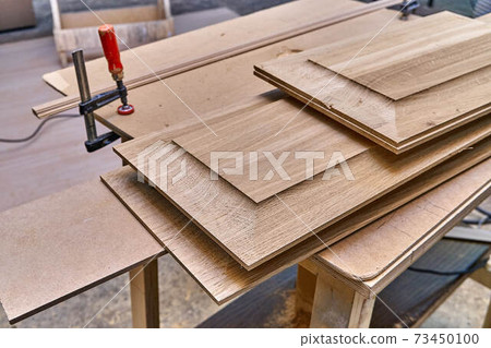 Joinery. Decorative door panels.Wood door manufacturing process. Furniture manufacture 73450100