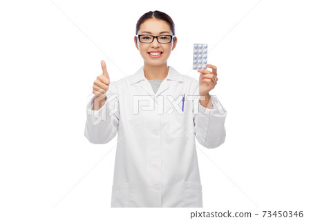 smiling asian female doctor or nurse with medicine 73450346