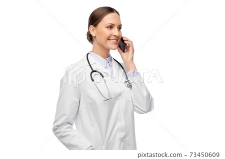 female doctor calling on smartphone female doctor calling on smartphone 73450609