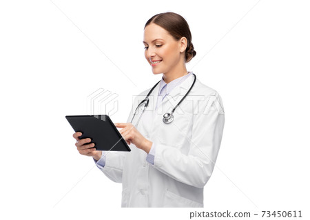happy female doctor with tablet pc and stethoscope happy female doctor with tablet pc and stethoscope 73450611
