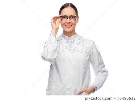 smiling female doctor in glasses and white coat smiling female doctor in glasses and white coat 73450632
