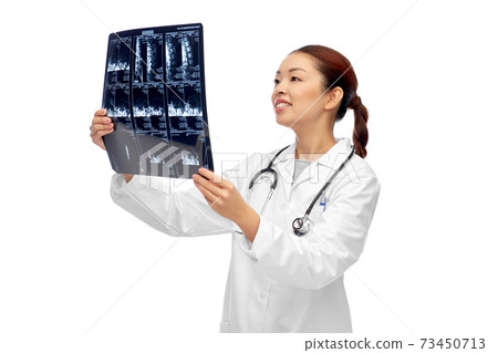 happy smiling asian female doctor looking at x-ray 73450713