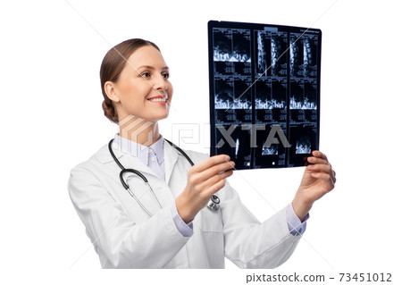 happy smiling female doctor with x-ray 73451012