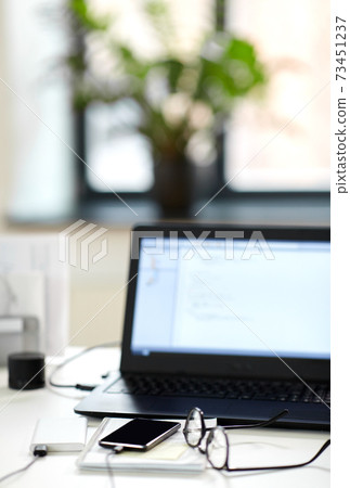 laptop, smartphone and notebook on table at office laptop, smartphone and notebook on table at office 73451237