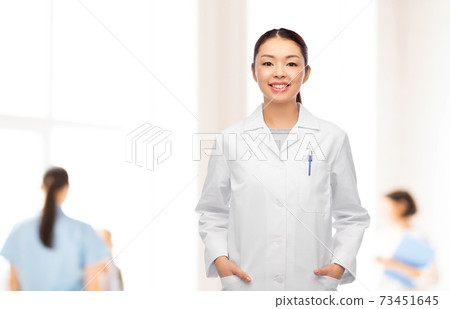 happy smiling asian female doctor at hospital happy smiling asian female doctor at hospital 73451645
