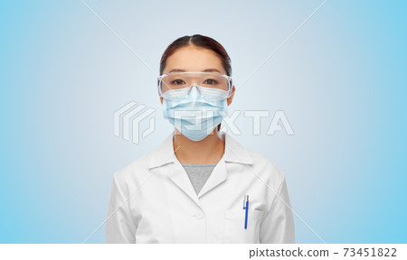 asian female doctor or scientist in medical mask 73451822